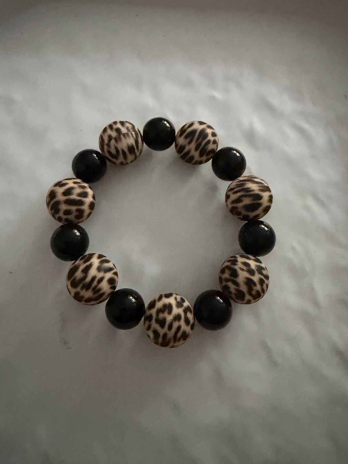A_Bracelet perles animal beige et noir